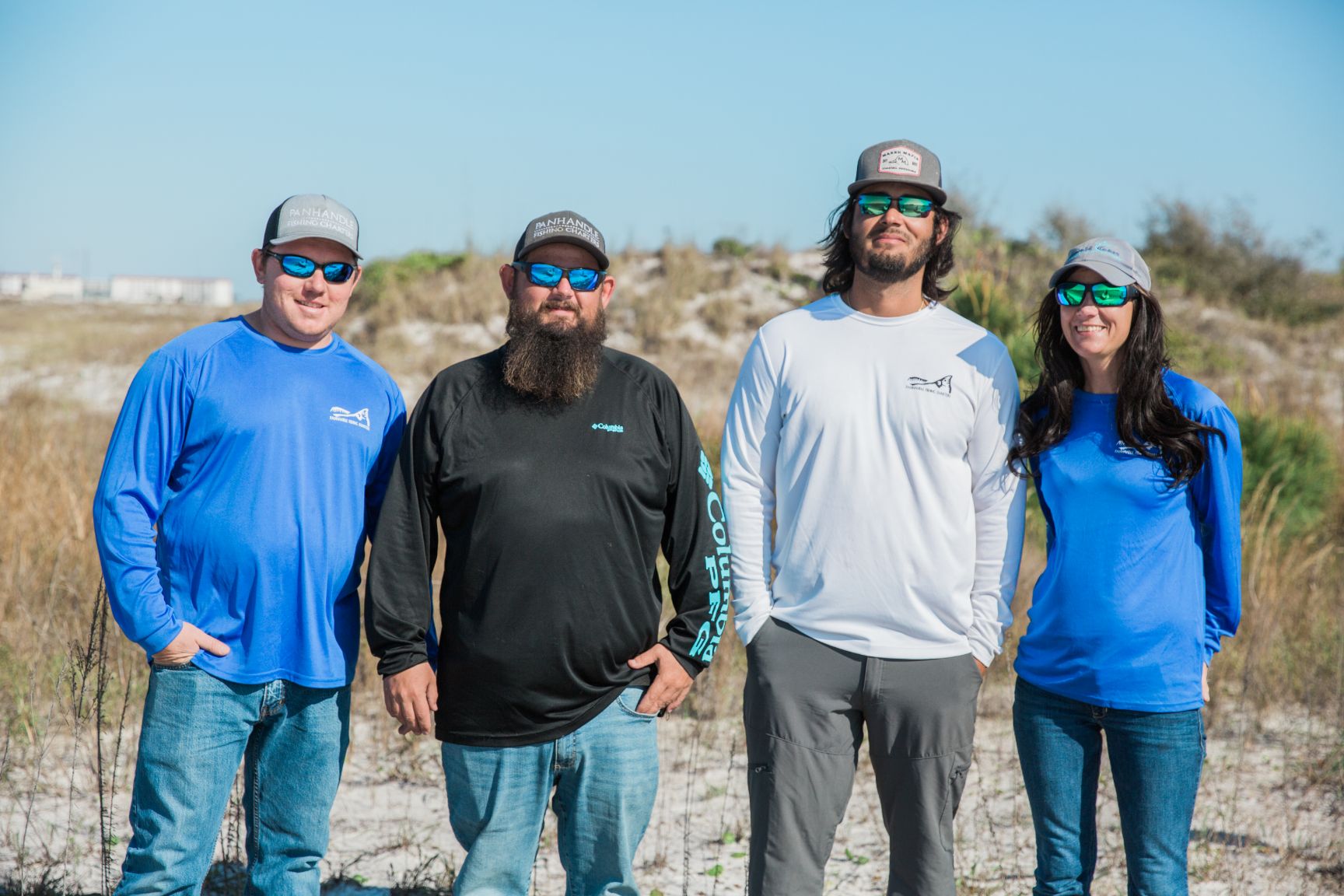 The crew from Panhandle Fishing Charters pose on the bank near Destin, FL